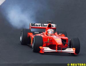 Barrichello's engine blows up