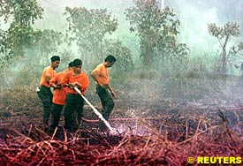 Malaysian firefighters fight blaze near Kuala Lumpur